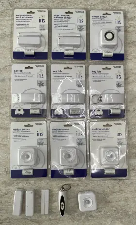 0388558 Iris Lot Of Misc Security System Items. Key Fobs Motion Sensors Door/window/cab