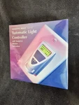 Brand New Sealed Sharper Image Automatic Light Controller Sound & Motion SI648. Price: $15.00.