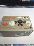 Intelectron 2 Outdoor Motion Detecting Security Lights BC8008K, New Open Box. Price: $18.00.