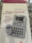 Radio Shack Passive Infrared Sensor Alarm 49-329 With Key Chain Remote Open. Price: $24.95.