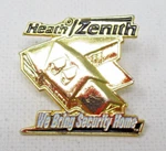 Heathzenith Lapel Pin We Bring Security Home Gold Tone Motion Detector Logo Used. Price: $12.95.