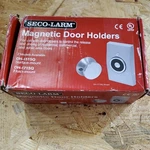 Seco-alarm DH-151SQ Door Holder Open. Price: $79.95.