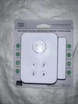 Smart Keypad Controlled Window Door Alarm, White, 4 Oz New. Price: $14.00.