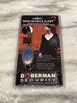 Doberman Personal Security Mini Mobile Alert Model SE-0201 New Sealed. Price: $18.95.