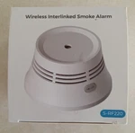 Aegislink Wireless Interlinked Smoke Alarm S-RF220 Open. Price: $10.00.