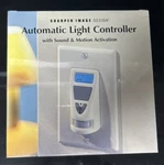 Brand New Sealed Sharper Image Automatic Light Controller Sound & Motion SI648. Price: $19.00.