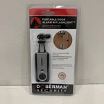 Doberman Security Portable Door Alarm W/ Flashlight Traveler Defense Brand. Price: $20.35.