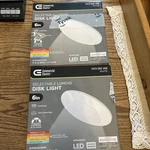 2 Commercial Electric 6" Selectable Lumens Disk Light, Dimmable, White, Round Open. Price: $13.42.